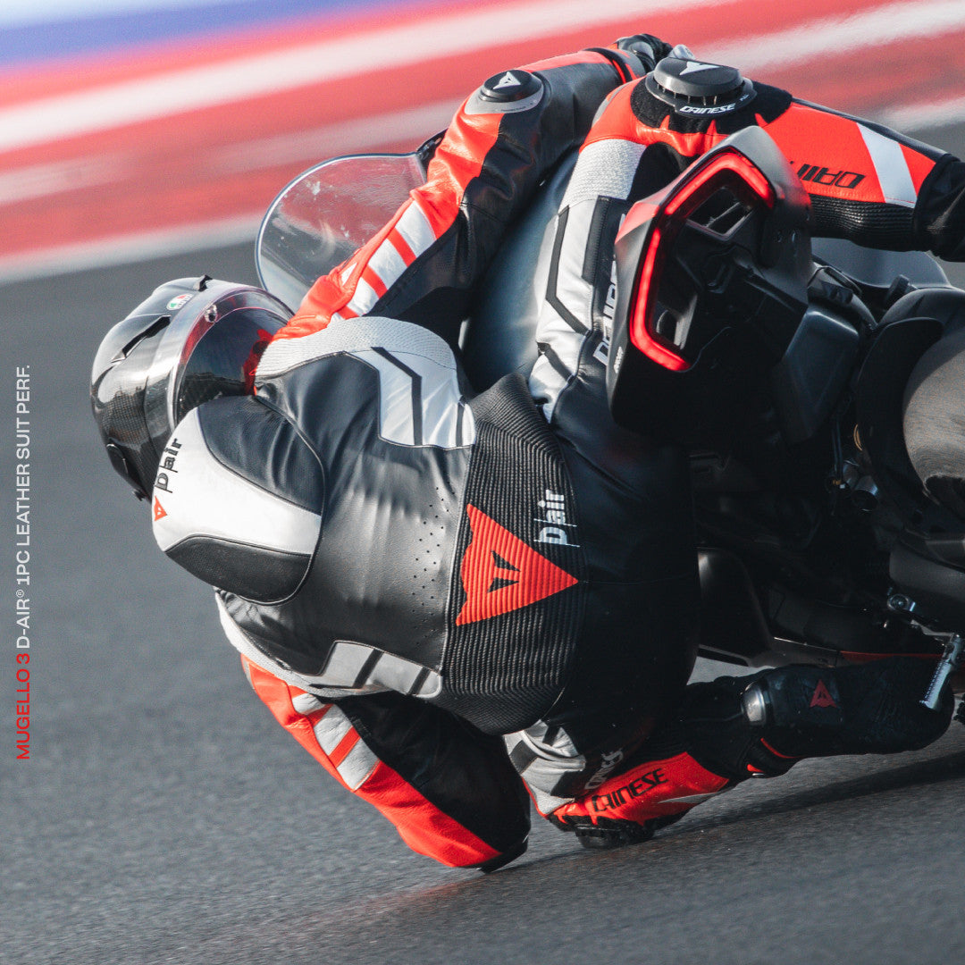 ダイネーゼ ムジェロ 3 D-AIR® ワンピース レザースーツ – パフォレーテッド エアバッグ レーシングスーツ | メンズ | ブラック/レッド 
